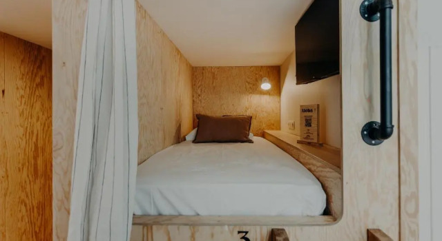 Кровать в общем номере Hôtel PALMITO