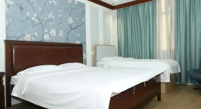 Семейный люкс Deluxe Yililan Hotel (Baiyangdian Never-Sleeping City Branch)