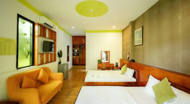 Четырёхместный номер Deluxe с балконом и с видом на сад Mai Phuong Binh Bungalow