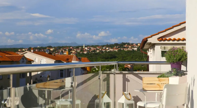Апартаменты с 2 комнатами с балконом и с видом на море Apartments Melin