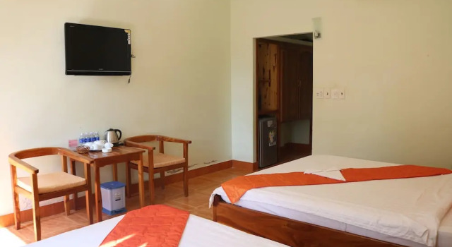 Четырёхместный семейный номер Standard с видом на сад Sunrise Village Hotel