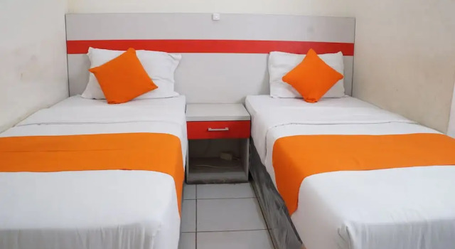 2 soveværelser i superior- dobbelt værelse Lucky Hotel Purwodadi