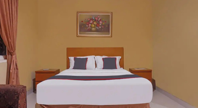 Premium Zimmer Capital O 92836 Villa Kampoeng Katineung