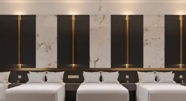 Кровать в общем номере Wen HOTEL