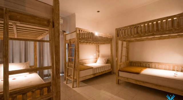 Кровать в общем номере Kayuma House Canggu