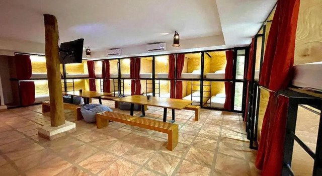 Кровать в общем номере Hotel Cerro Lodge