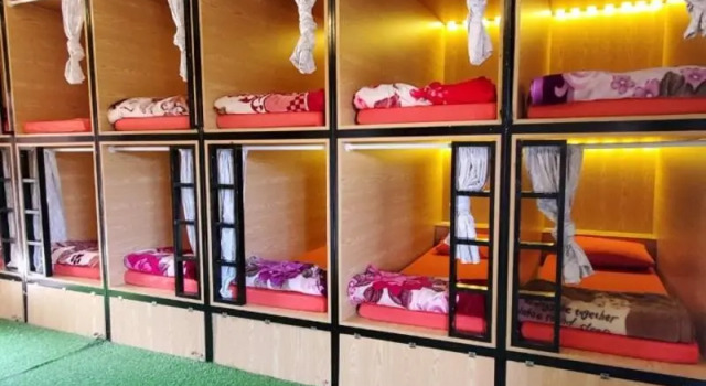 Кровать в общем номере Tropical Garden Homestay