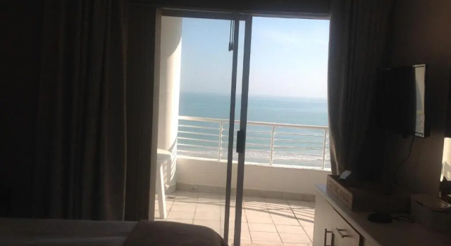 Апартаменты Beach front property