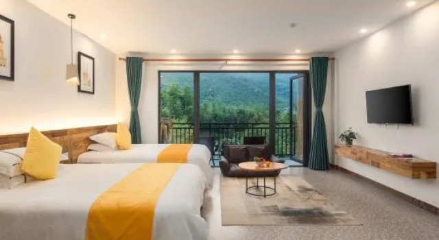 Кровать в общем номере с 6 комнатами Moganshan Shisu Parent-child Holiday Homestay