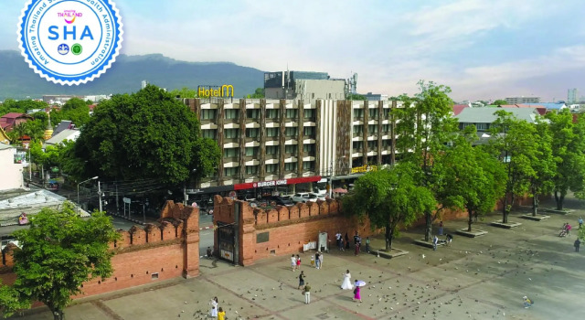 Кровать в общем номере Hotel M Chiang Mai