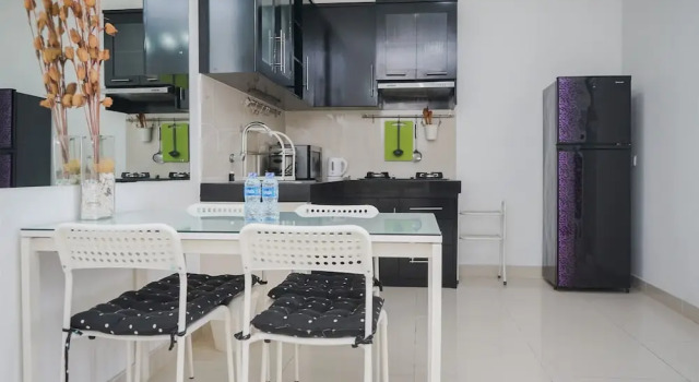 Апартаменты Strategic And Homey 2Br At Puri Garden Apartment Near Mall