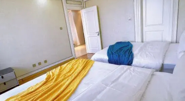 Люкс Ganghui Four Seasons Hotel Apartment (Dalian Railway Station Zhongshan Square)