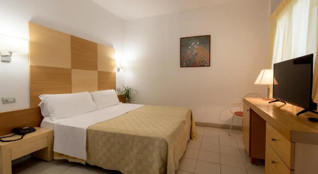 Четырёхместный номер Economy Maritalia Hotel Club Village - All Inclusive