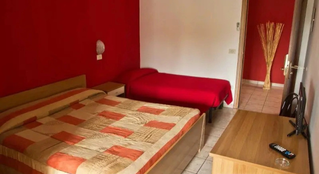 Трёхместный номер Albergo Papillon