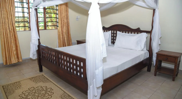 Апартаменты с 2 комнатами с балконом и рядом с пляжем Galu Gardens Apartments Diani Beach