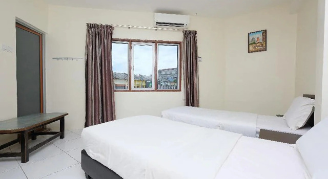 Люкс OYO 1104 Q Hotel