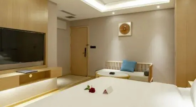 Семейный люкс JINSHUNTIANHUA Hotel (Qujing Wanda Plaza)