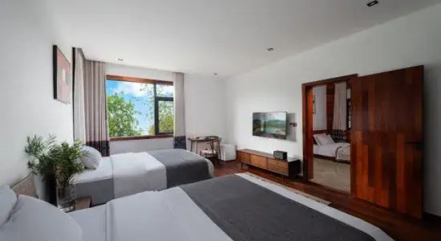 Семейный люкс с 2 комнатами Beihai Weizhou Island Yeli Courtyard Vacation Apartment (Beike Beach Lanqiao)