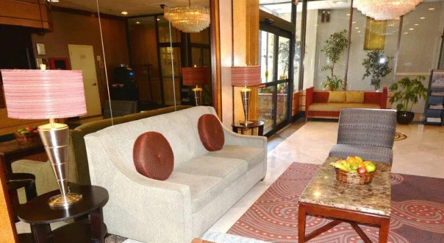 Кровать в общем номере Adria Hotel and Conference Center