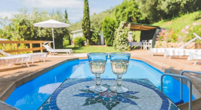 Коттедж Exclusive beautiful pool house surrounded by greenery, modern, luxury finishes