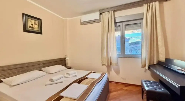Семейные апартаменты с балконом и с частичным видом на море Beachfront Apartments Oaza 2