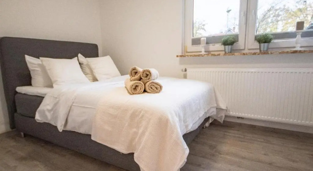 WG 8 - Modern ausgestattetes Ferienhaus mit Garten für 2 Personen, Забронировать Отель Куксхафен 