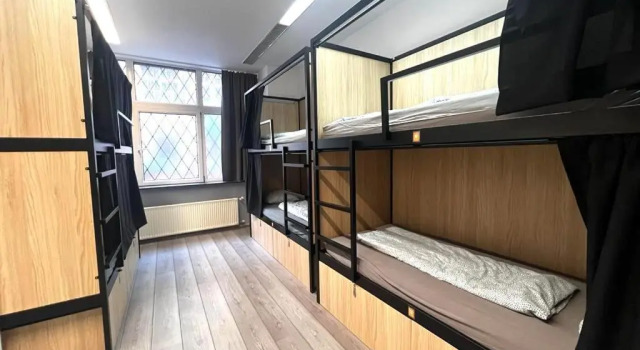 Кровать в общем номере Onefam Budapest