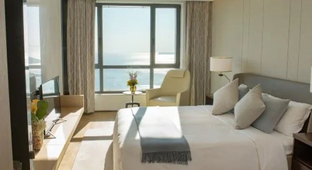 Люкс с 2 комнатами с видом на океан Haiyi International Apartment