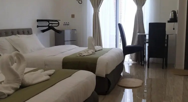 Habitación cuádruple familiar Estándar con balcón Mirage Suites de Boracay