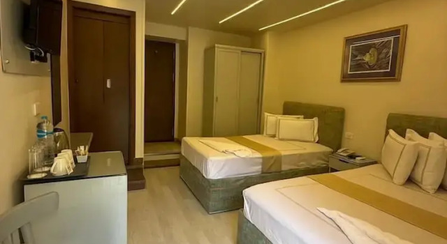 Трёхместный номер Deluxe с балконом Ambiance Hotel Downtown