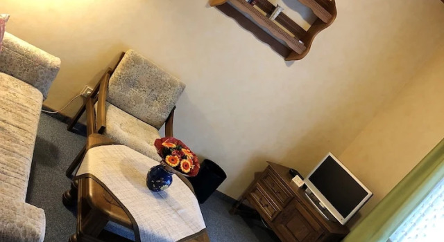Апартаменты Cafe Best Gästezimmer