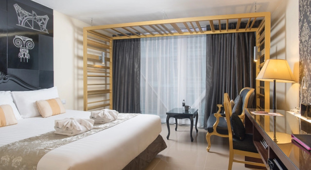Кровать в общем номере Nimman Mai Design Hotel Chiang Mai