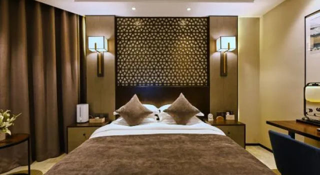 Семейный люкс JiaYuGuan RuiCheng Sunac Hotel