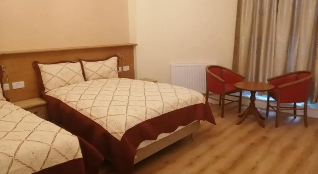 Четырёхместный номер Deluxe Cumberland Hotel