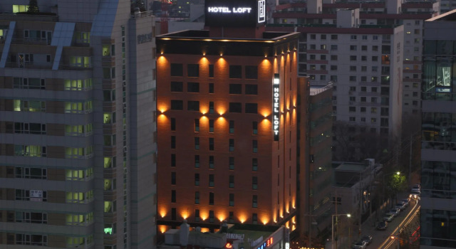 Кровать в общем номере Boutique Hotel Loft