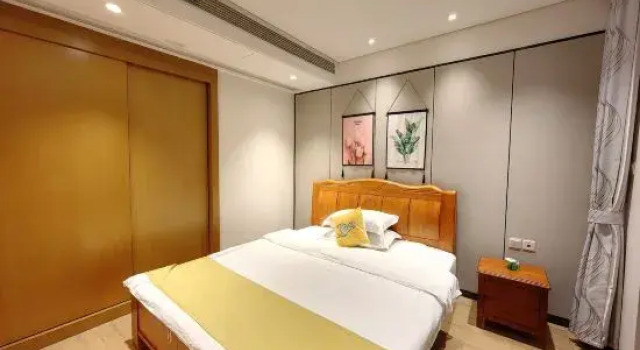 Люкс с 2 комнатами с видом на сад Yujianni Seaview Apartment