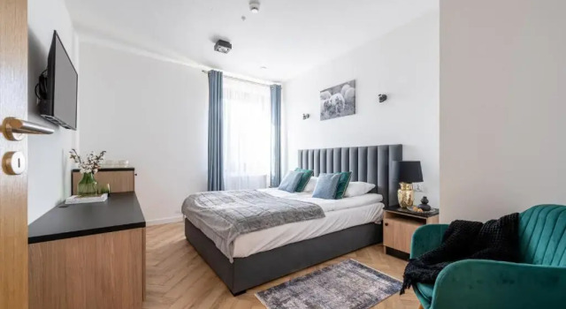 Апартаменты Modom Holiday Szymony 15 B Aparteo