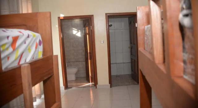Кровать в общем номере Keva Guest House