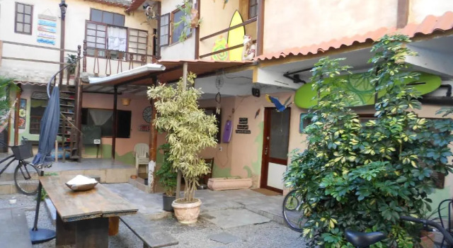 Кровать в общем номере Casa do Bill Recreio