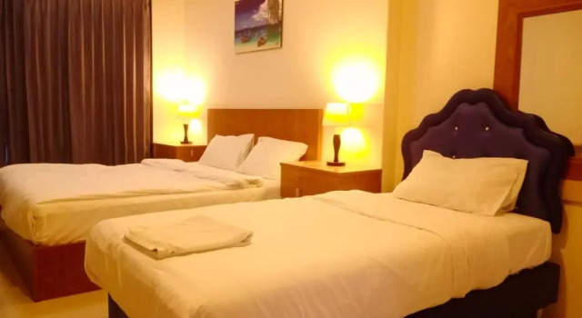 Трёхместный номер Standard с видом на сад OYO 665 Sj House Hotel