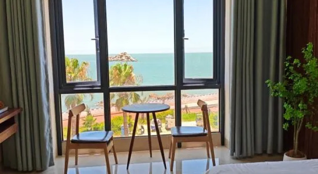 Кровать в общем номере Meizhou Island Beach Impression Seaview B&B