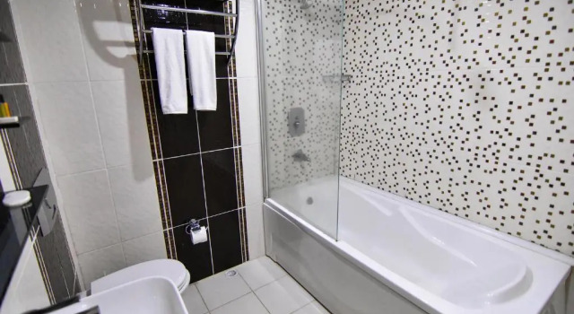 Номер Deluxe Green Palace Suite Hotel