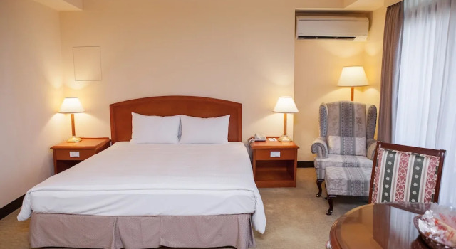 Семейный люкс Jiuwu Hotel