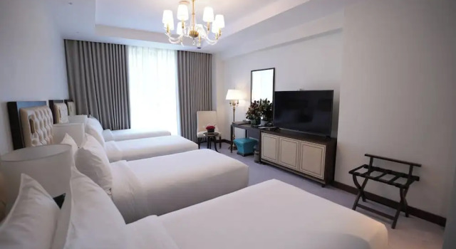 Четырёхместный номер Deluxe с видом на город Peninsula Worth Hotel