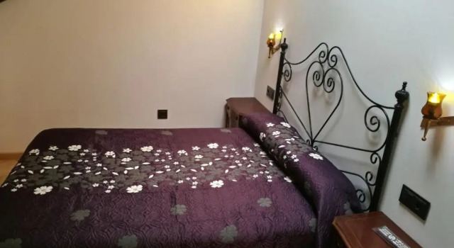 Кровать в общем номере Albergue Savior