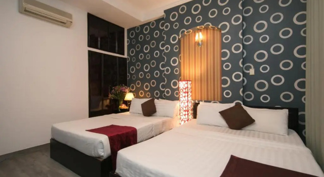 Трёхместный номер Deluxe с видом на город Anh Duy Hotel - Nguyễn Công Trứ The Bitexco Neighbour