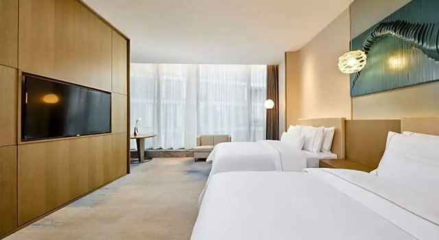 Четырёхместный номер Deluxe с видом на город The Westin Qingdao West Coast