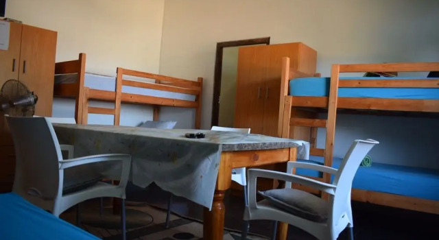 Кровать в общем номере Oudtshoorn Homestay Accommodation