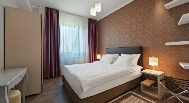 Четырёхместные апартаменты с 2 комнатами с балконом Tomis Garden Apartments Mamaia