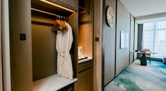 Полулюкс Deluxe Weihai Xintai International Hotel